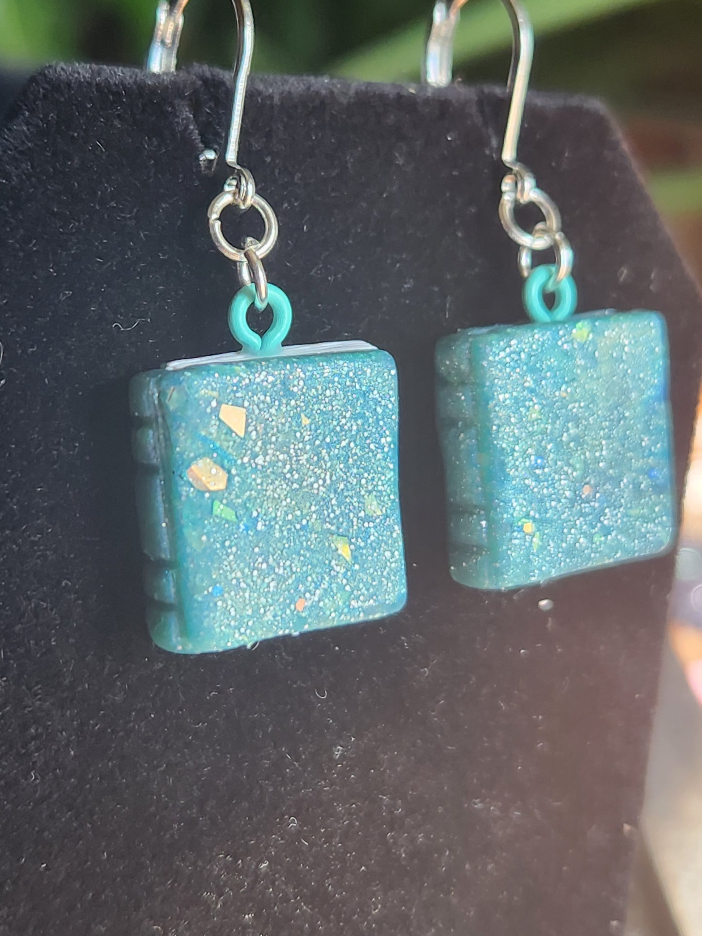 B3: Teal Sparkly Book earrings