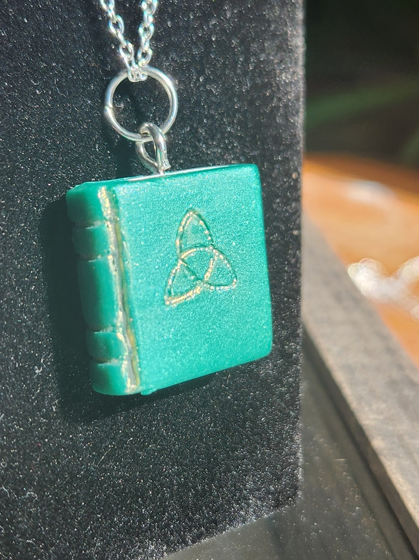 B4: Trinity Book pendant